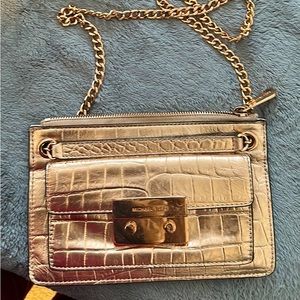 Michael Kors rose gold couch bag